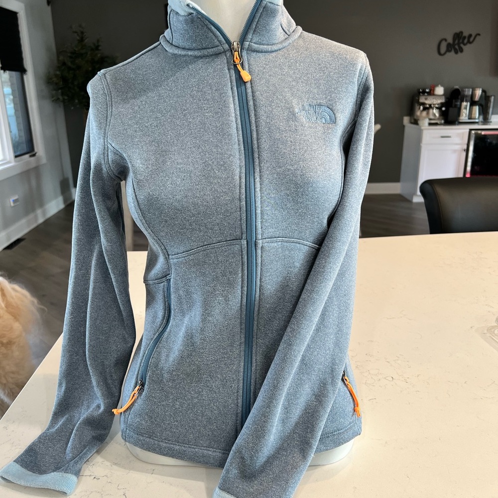 North Face jacket light blue with tangerine strings. Size Small